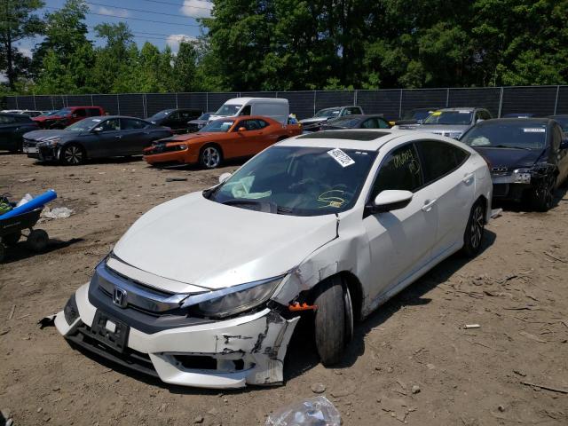 Photo 2 from auction – 2017 HONDA CIVIC EX with VIN 2HGFC2F75HH523802