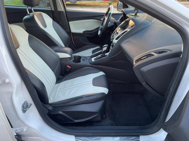 Фото 5 с аукциона – 2012 FORD FOCUS SEL с VIN 1FAHP3M21CL359748