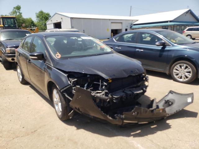 FORD FOCUS SE 2014 with VIN 1FADP3K28EL128009 - Photo from auction