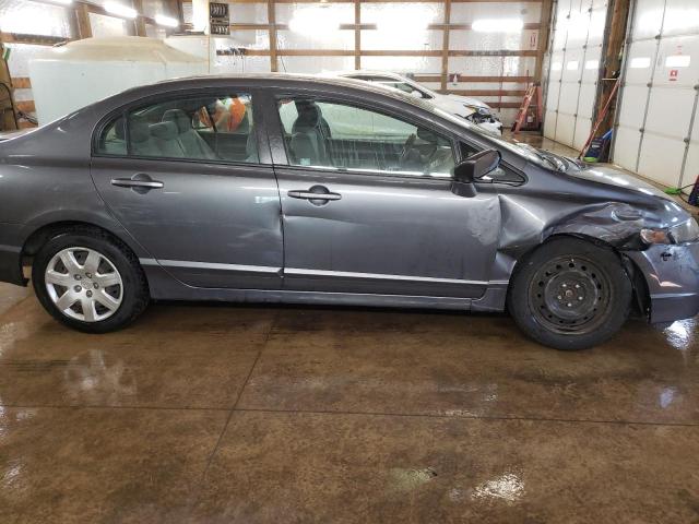Photo 9 from auction – 2011 HONDA CIVIC LX with VIN 19XFA1F52BE039182