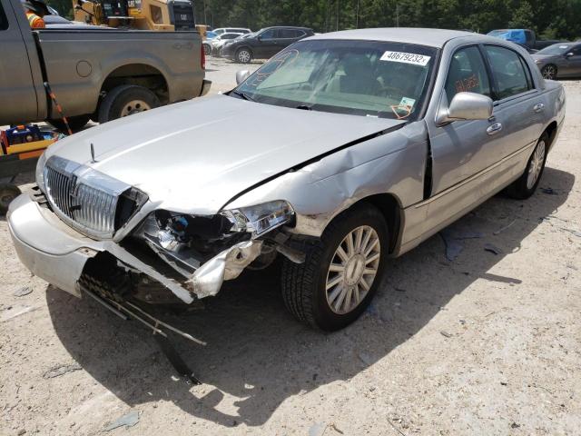 Photo 2 from auction – 2003 LINCOLN TOWN CAR with VIN 1LNHM82W13Y695033