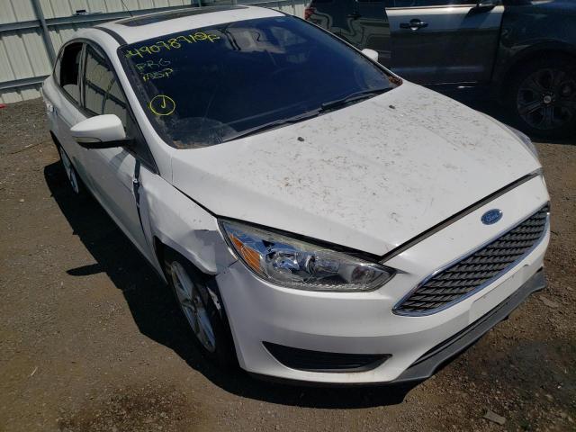 FORD FOCUS SE 2015 with VIN 1FADP3F26FL329158 - Photo from auction