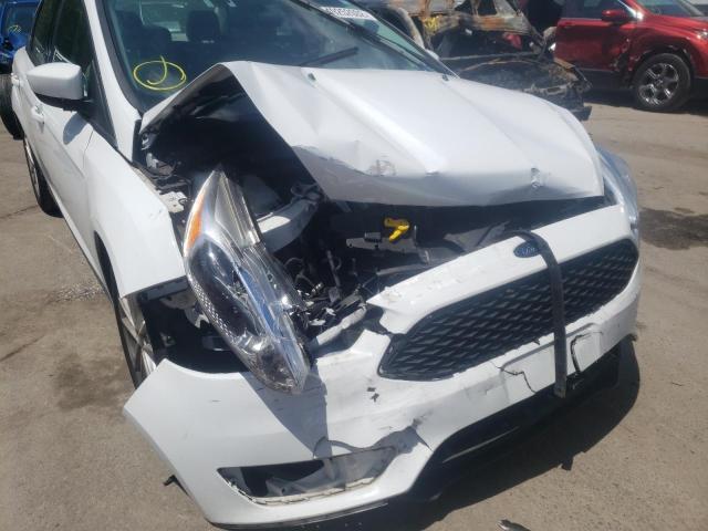 Photo 9 from auction – 2018 FORD FOCUS SE with VIN 1FADP3F27JL214142