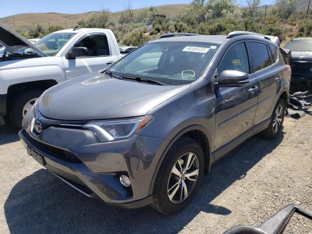 Photo 2 from auction – 2018 TOYOTA RAV4 ADVEN with VIN JTMRFREV2JD230423