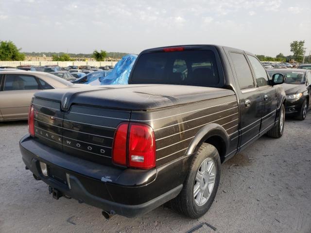 Photo 4 from auction – 2002 LINCOLN BLACKWOOD with VIN 5LTEW05A12KJ02580