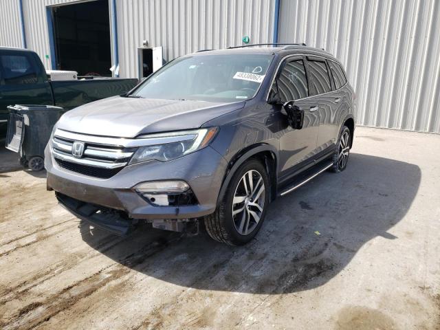Photo 2 from auction – 2016 HONDA PILOT TOUR with VIN 5FNYF6H97GB104441