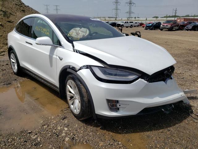 TESLA MODEL X 2021 with VIN 5YJXCAE25MF321531 - Photo from auction