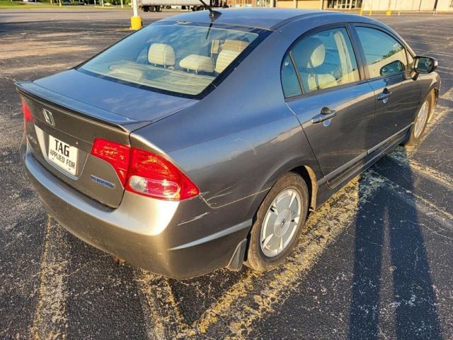 Photo 4 from auction – 2007 HONDA CIVIC HYBR with VIN JHMFA36207S016536