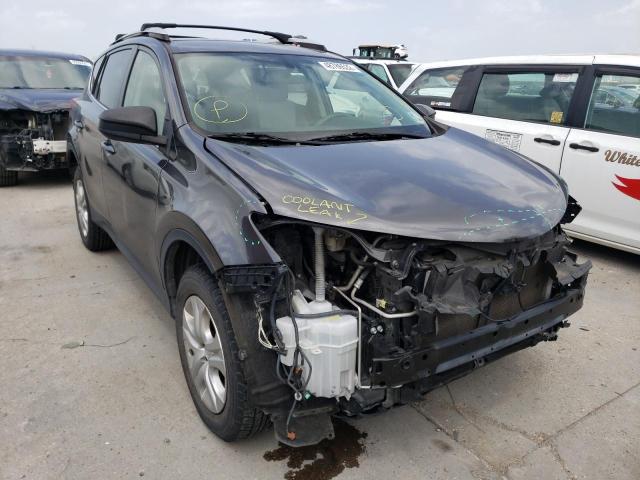 TOYOTA RAV4 LE 2014 with VIN JTMZFREV9EJ004077 - Photo from auction