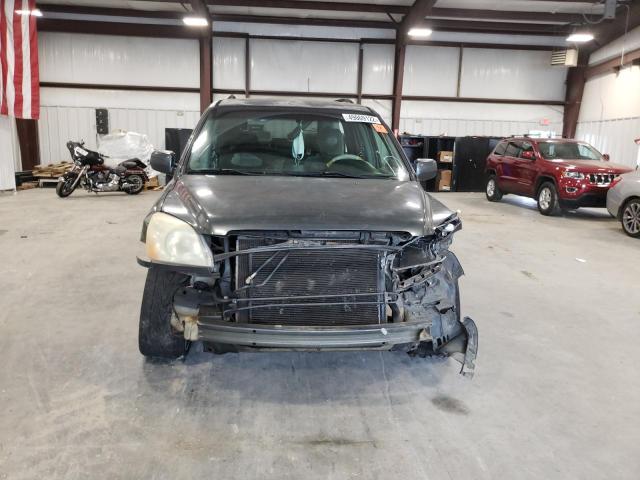 Photo 9 from auction – 2003 HONDA PILOT EX with VIN 2HKYF18493H588261