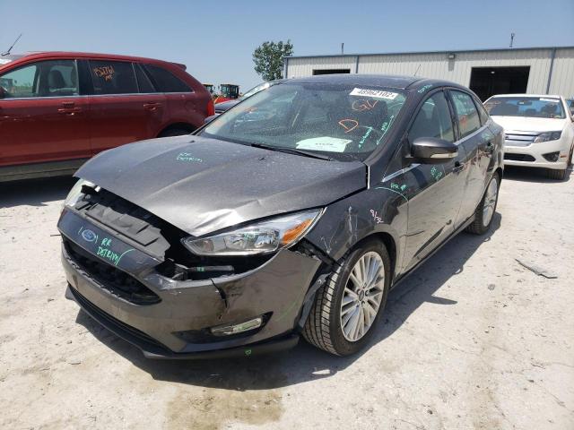 Photo 2 from auction – 2015 FORD FOCUS TITA with VIN 1FADP3J22FL357319