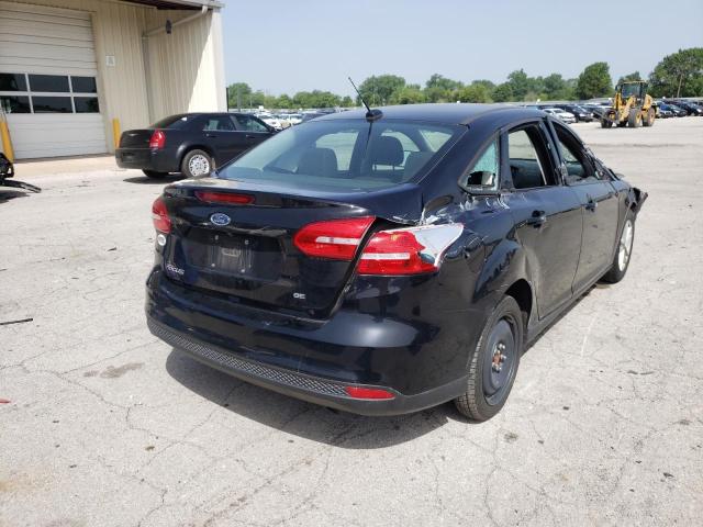 Photo 4 from auction – 2017 FORD FOCUS SE with VIN 1FADP3F27HL302411