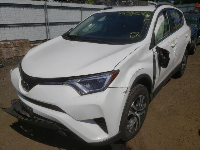 Photo 2 from auction – 2017 TOYOTA RAV4 LE with VIN JTMBFREV6HJ702233