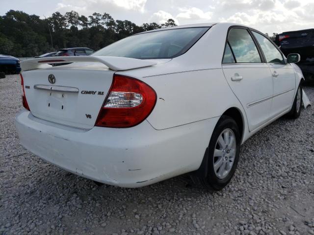 Photo 4 from auction – 2002 TOYOTA CAMRY LE with VIN 4T1BF32K62U504129