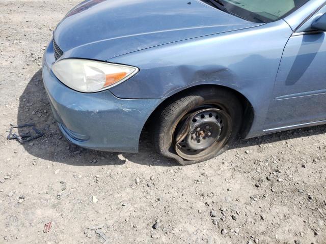 Photo 10 from auction – 2004 TOYOTA CAMRY LE with VIN 4T1BE32K84U892079