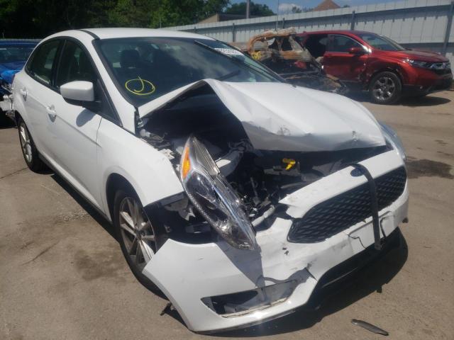 FORD FOCUS SE 2018 with VIN 1FADP3F27JL214142 - Photo from auction