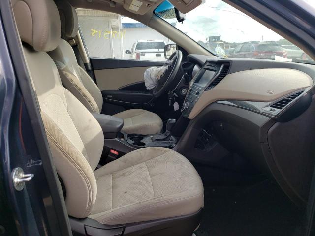 Photo 5 from auction – 2017 HYUNDAI SANTA FE S with VIN 5NMZU3LB0HH019007