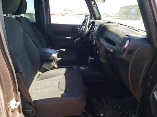 Photo 5 from auction – 2014 JEEP WRANGLER U with VIN 1C4BJWDG8EL301251