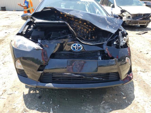 Photo 9 from auction – 2014 TOYOTA PRIUS C with VIN JTDKDTB35E1565545