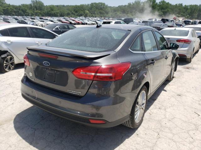 Photo 4 from auction – 2015 FORD FOCUS TITA with VIN 1FADP3J22FL357319