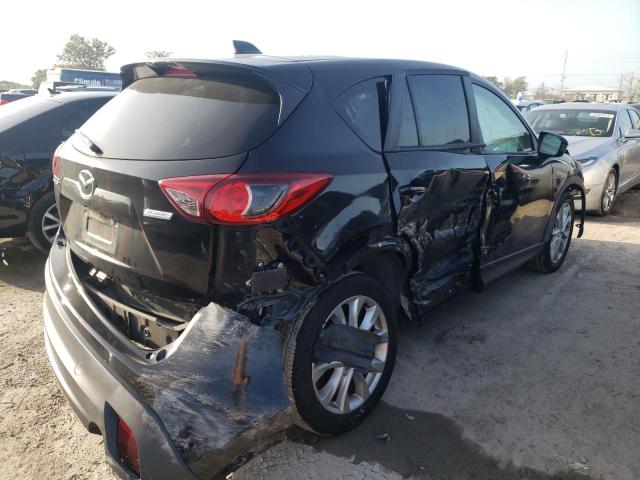 Photo 4 from auction – 2014 MAZDA CX-5 GT with VIN JM3KE2DY0E0381112