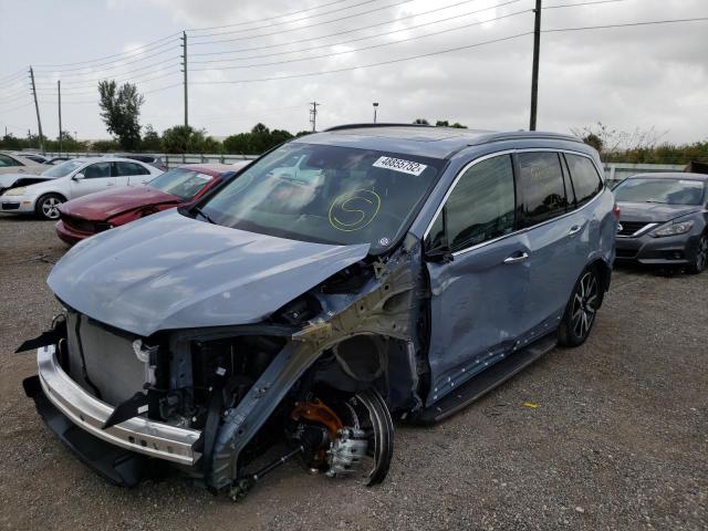 Photo 2 from auction – 2022 HONDA PILOT TOUR with VIN 5FNYF5H98NB013704