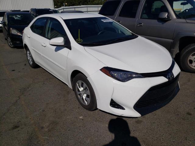 TOYOTA COROLLA L 2017 with VIN 5YFBURHE4HP690855 - Photo from auction