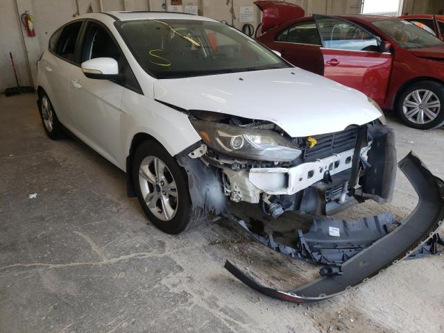 FORD FOCUS SE 2014 with VIN 1FADP3K26EL265062 - Photo from auction