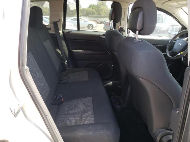 Photo 6 from auction – 2010 JEEP COMPASS SP with VIN 1J4NT4FB0AD601829