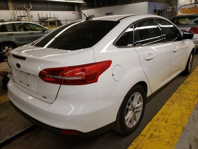 Photo 4 from auction – 2018 FORD FOCUS SE with VIN 1FADP3F21JL302801