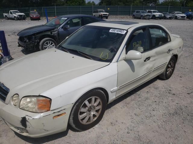 Photo 9 from auction – 2004 KIA OPTIMA LX with VIN KNAGD128345345735