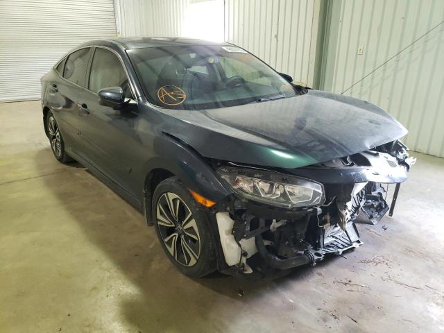 HONDA CIVIC EXL 2018 with VIN JHMFC1F72JX024643 - Photo from auction