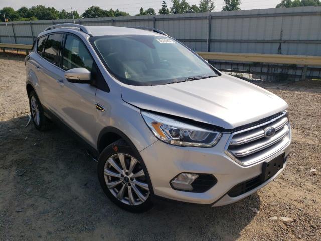 FORD ESCAPE TIT 2017 with VIN 1FMCU9J94HUC99351 - Photo from auction