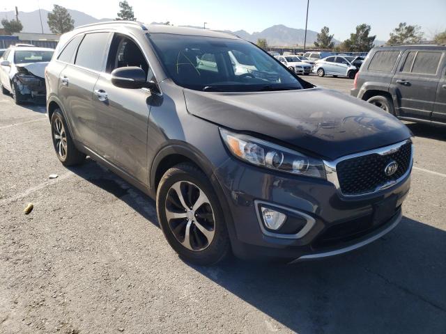 KIA SORENTO 2016 with VIN 5XYPH4A12GG020552 - Photo from auction