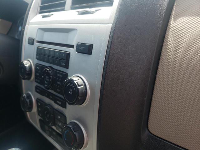 Photo 9 from auction – 2010 MERCURY MARINER with VIN 4M2CN8B78AKJ09930
