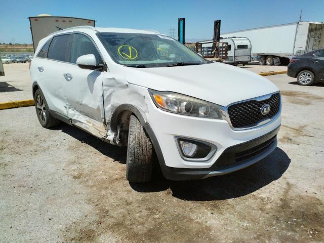 KIA SORENTO EX 2016 with VIN 5XYPH4A54GG077791 - Photo from auction