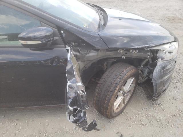 Photo 9 from auction – 2015 FORD FOCUS SE with VIN 1FADP3F23FL273325