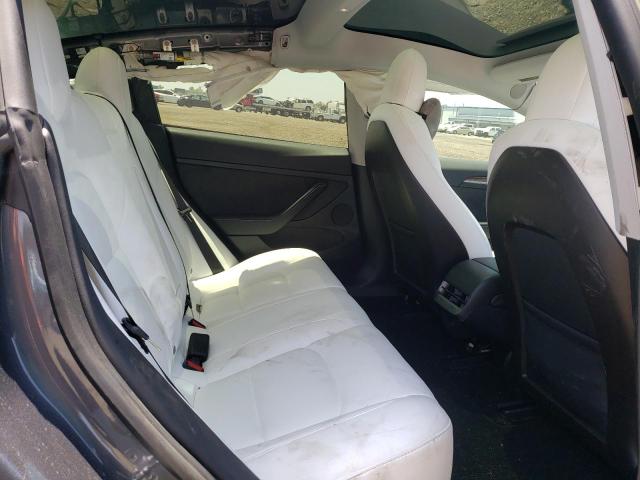 Photo 6 from auction – 2021 TESLA MODEL 3 with VIN 5YJ3E1EC3MF995579