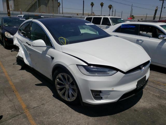 TESLA MODEL X 2018 with VIN 5YJXCAE25JF102368 - Photo from auction