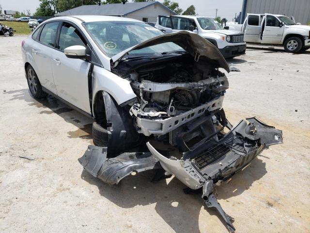 FORD FOCUS SE 2014 with VIN 1FADP3F23EL231297 - Photo from auction