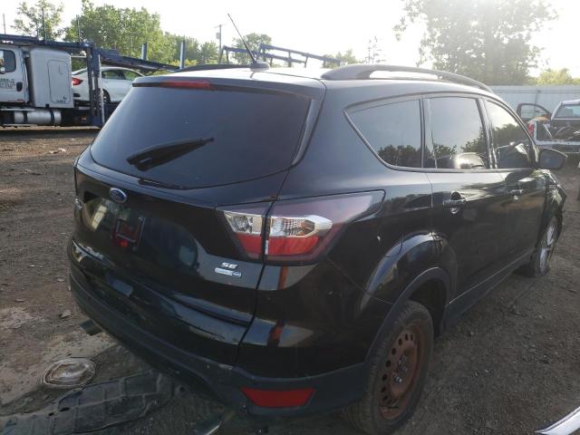 Photo 4 from auction – 2017 FORD ESCAPE SE with VIN 1FMCU9G97HUB48575