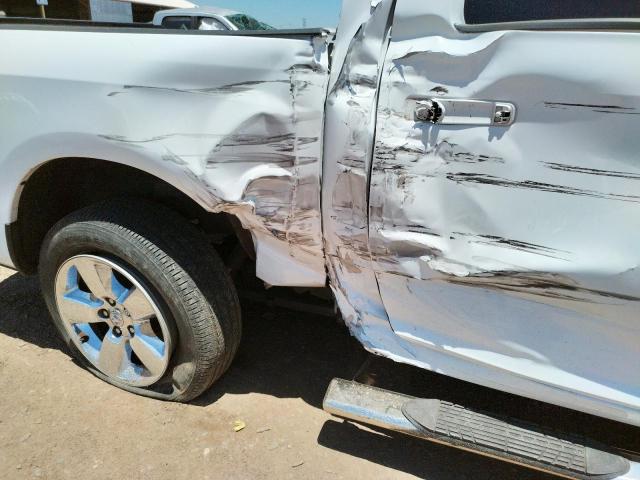 Photo 9 from auction – 2014 RAM 1500 SLT with VIN 1C6RR6LT0ES140056