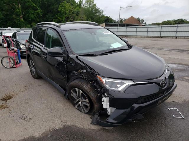 TOYOTA RAV4 LE 2018 with VIN 2T3BFREV6JW824727 - Photo from auction