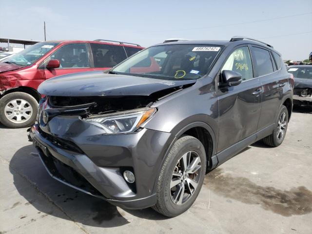 Photo 2 from auction – 2017 TOYOTA RAV4 XLE with VIN JTMWFREVXHD100659