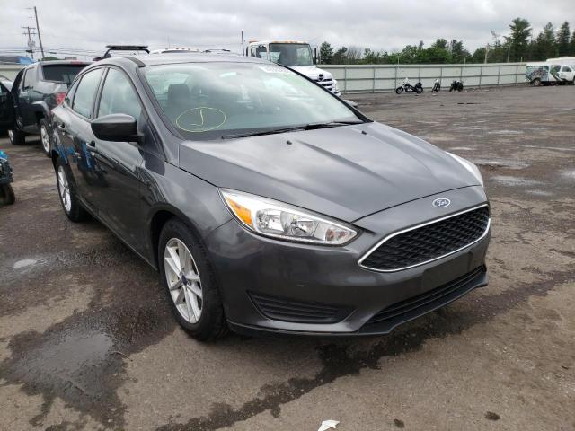 FORD FOCUS SE 2018 with VIN 1FADP3F29JL318714 - Photo from auction
