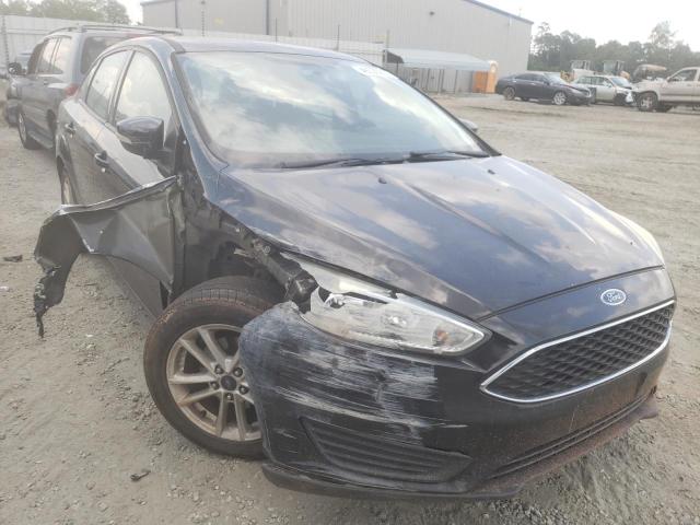 FORD FOCUS SE 2015 with VIN 1FADP3F23FL273325 - Photo from auction