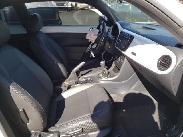 Photo 5 from auction – 2012 VOLKSWAGEN BEETLE with VIN 3VWHP7AT2CM622291