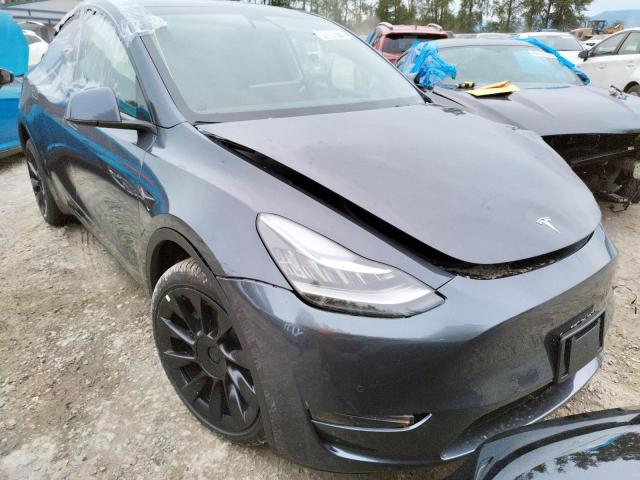 Photo 4 from auction – 2022 TESLA MODEL Y with VIN 7SAYGDEE9NF386357
