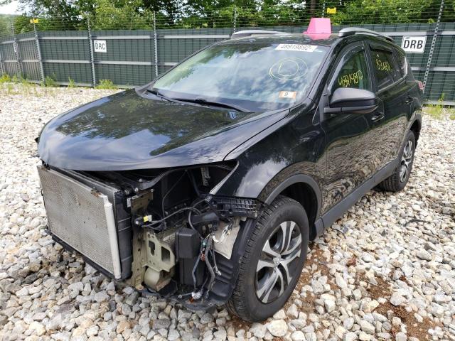 Photo 2 from auction – 2017 TOYOTA RAV4 LE with VIN 2T3BFREV0HW575206