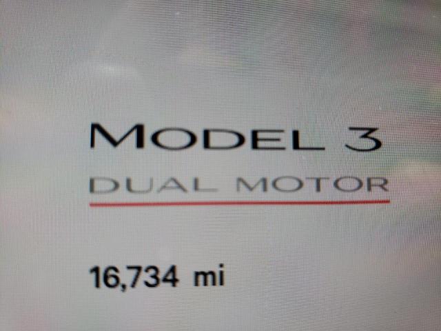 Photo 8 from auction – 2021 TESLA MODEL 3 with VIN 5YJ3E1EC3MF995579